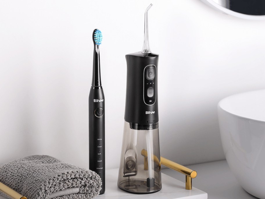 Bitvae water flosser next to bitvae toothbrush