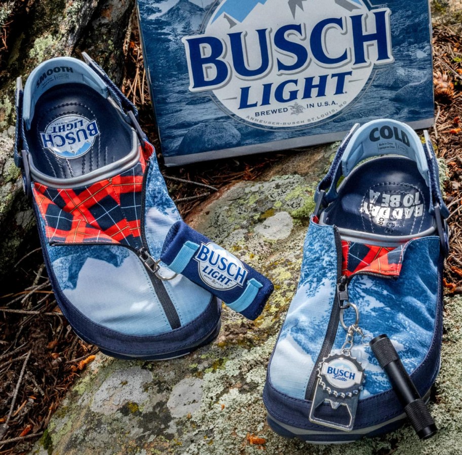 Busch light crocs next to a case of busch light beer, a gift for a winter texan or midwest dad