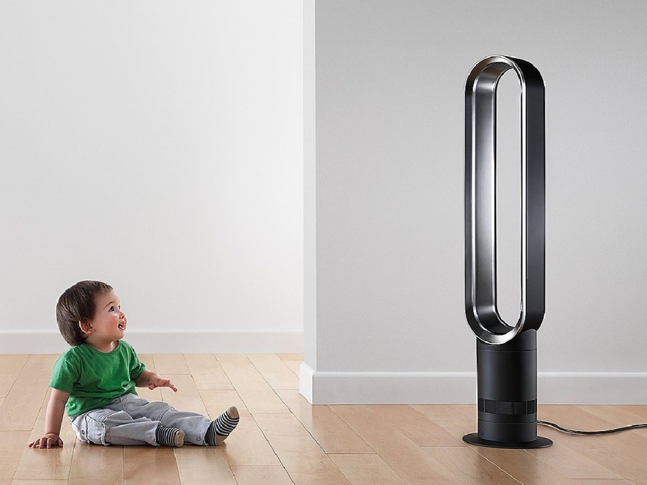 Child in front of bradeless fan