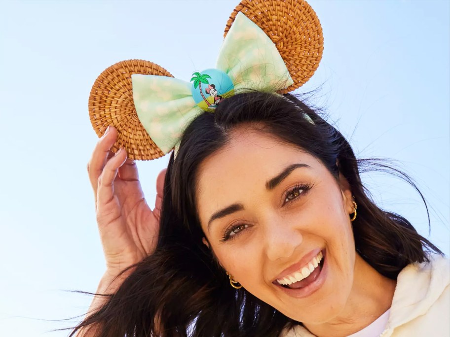 woman wearing woven mouse ears headband