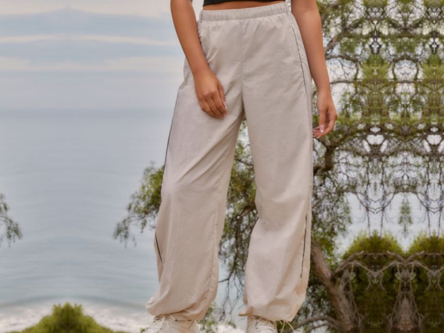 Woman wearing Gilly Hicks Parachute pants