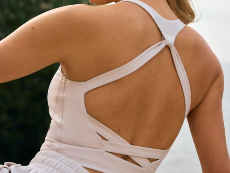 Back view of a woman wearing a Gilly Hicks Recharge Tank