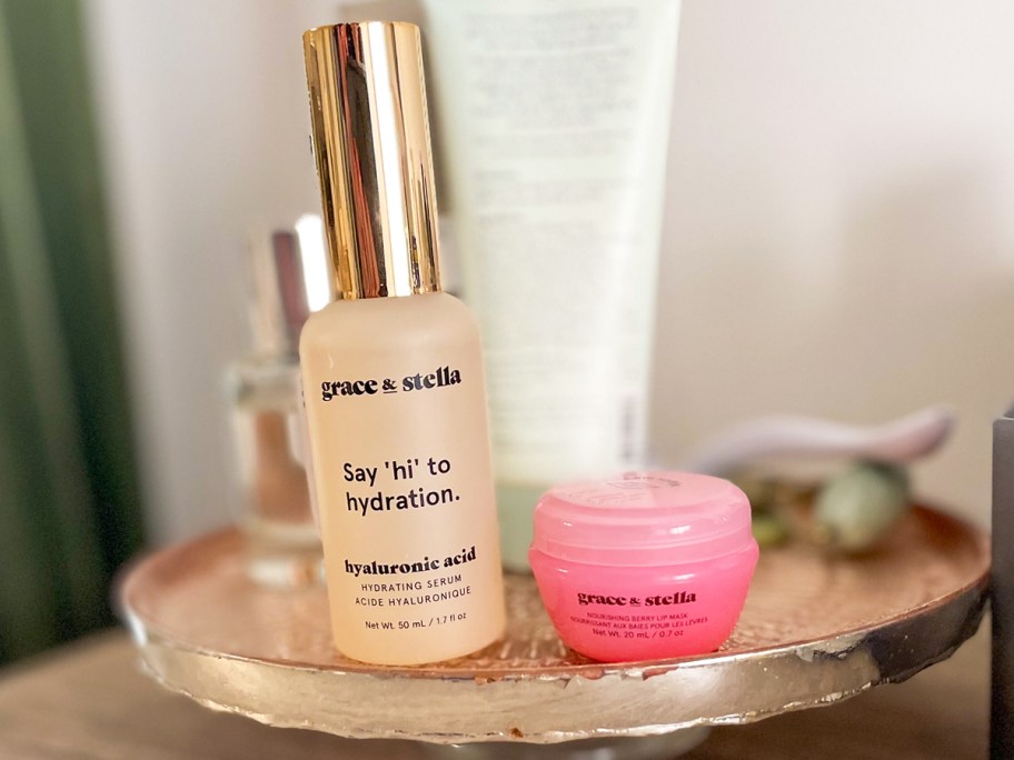 Grace & Stella Hyaluronic Acid Serum & Lip Mask on gold tray