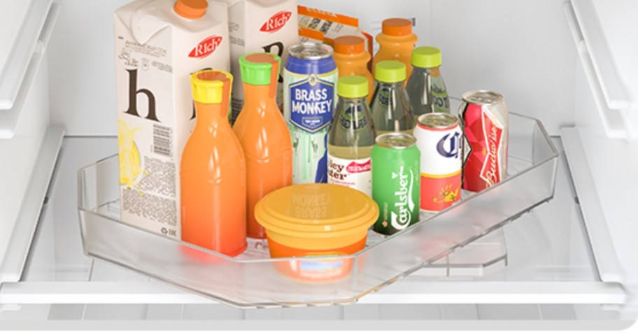 clear plastic lazy susan organizer in fridge with food and drinks 