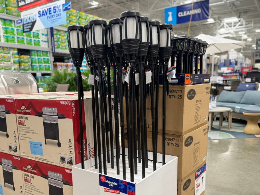 display of solar outdoor Tiki Torch lights at Lowe's