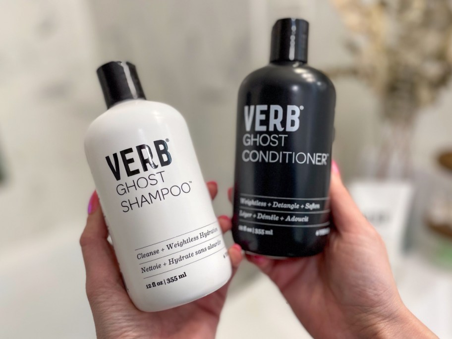 Hand holding Verb Shampoo and Conditioner