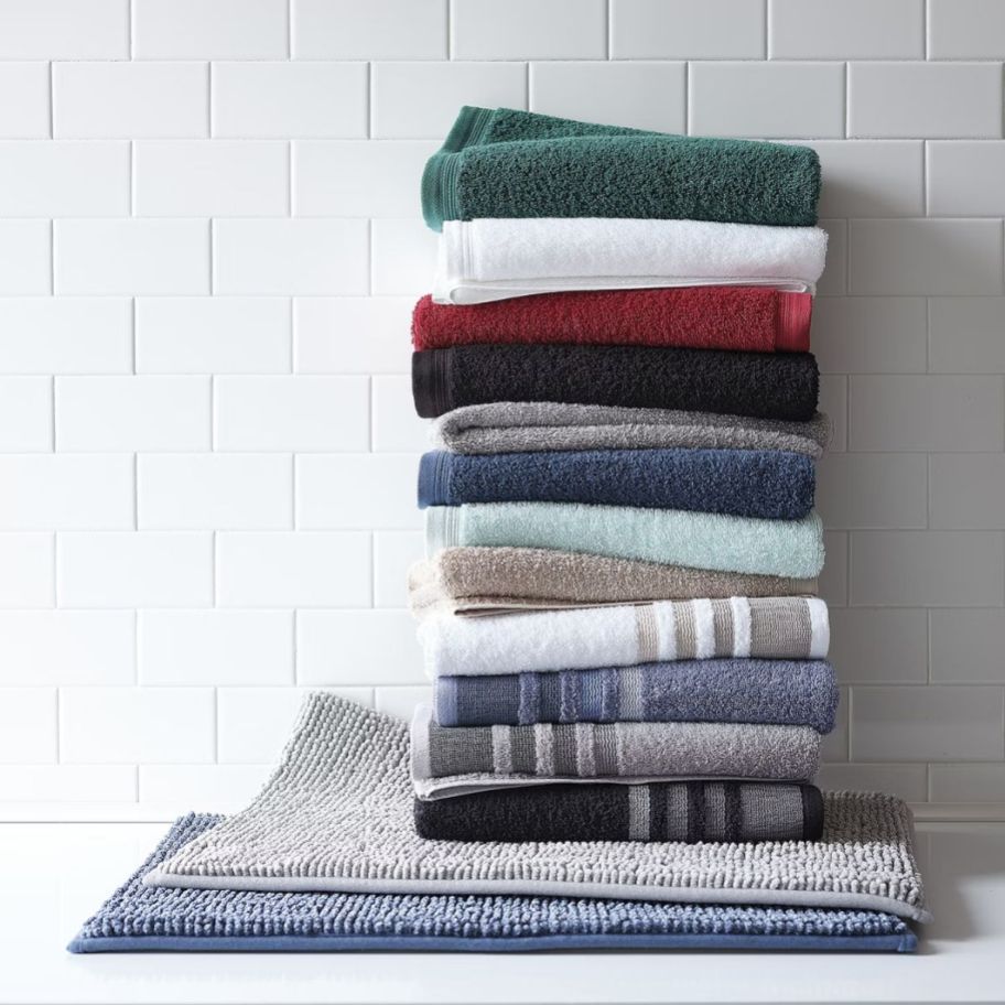 a stack of colored towels