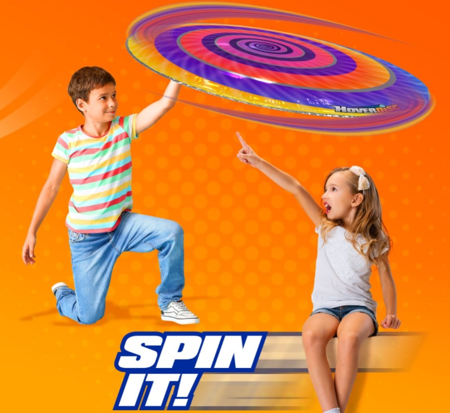 stock image of boy and girl with hoverdisc toy