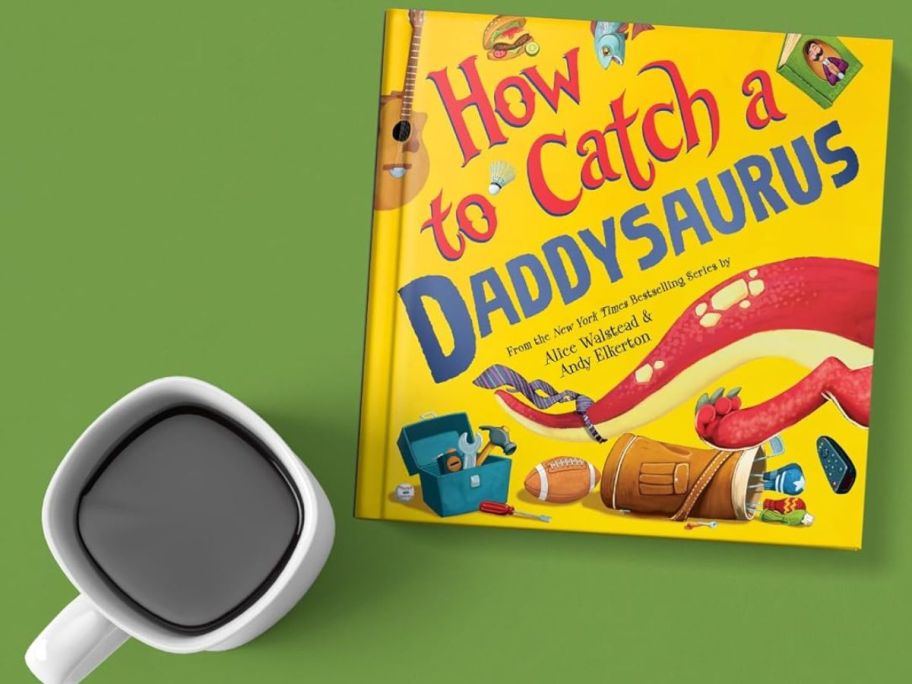 How to catch a Daddysaurus book next to a cup of coffee
