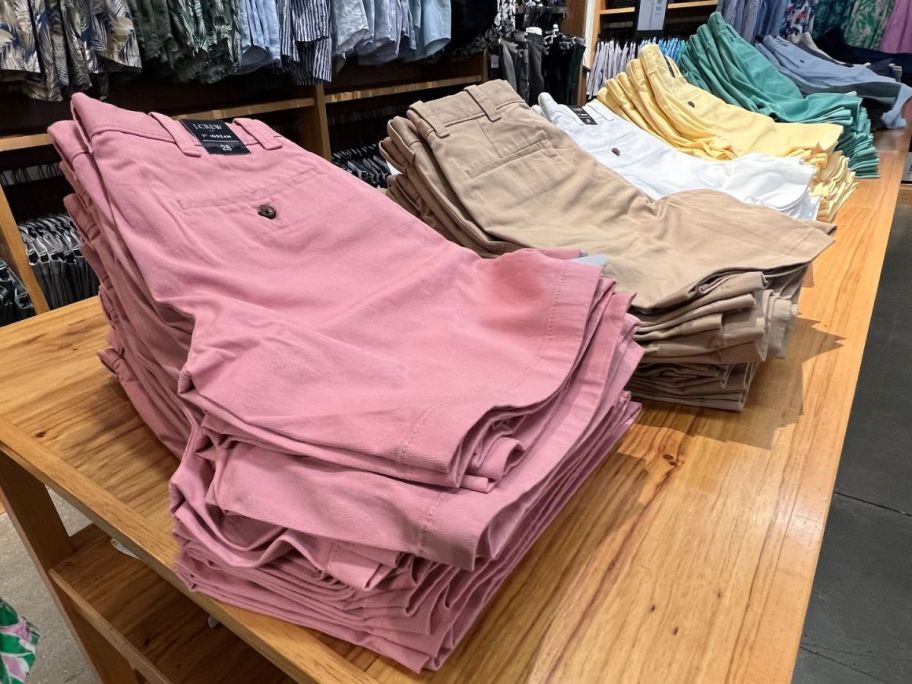 Stacks of JCrew Sorts at a factory store