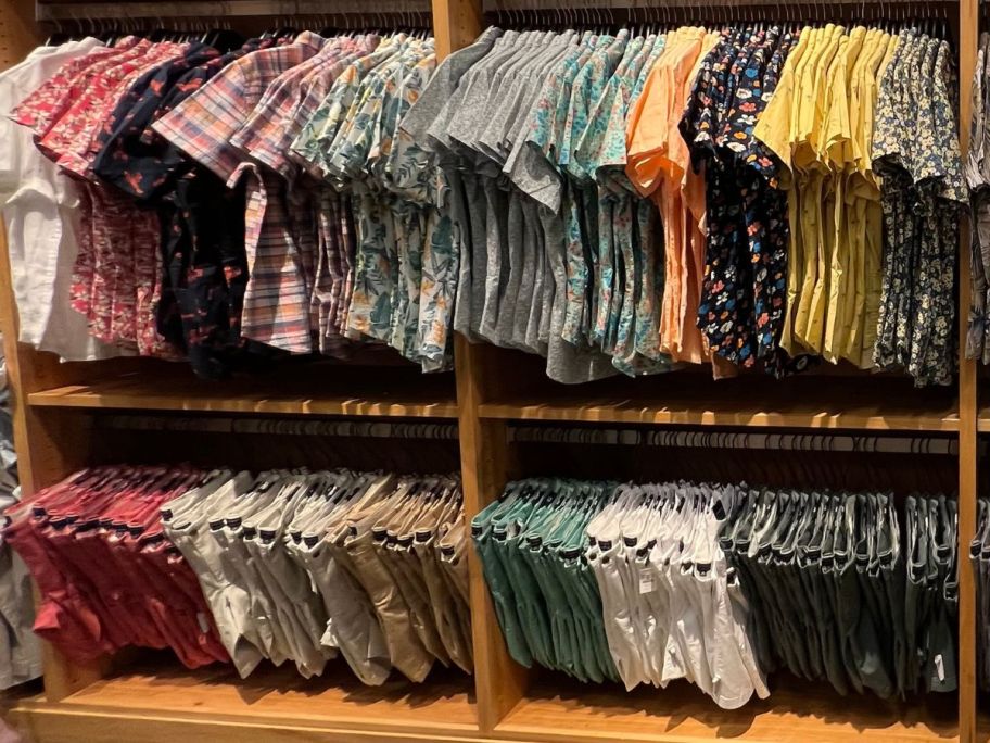 A Wall of Buntton down shirts for men at a JCrew Store