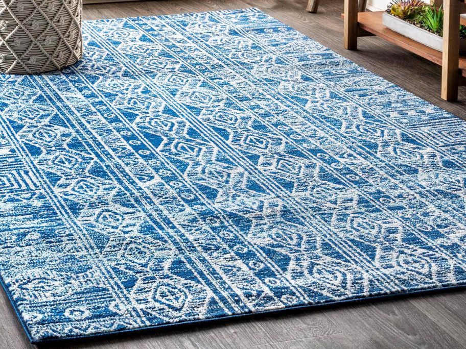 blue and white area rug in living room