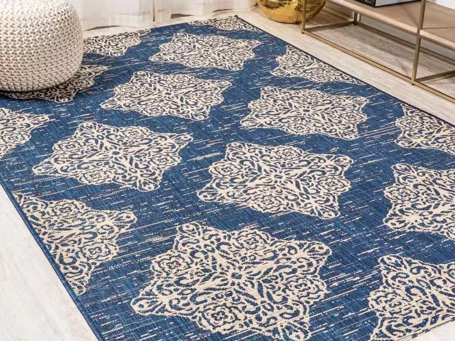 blue and white area rug in living room