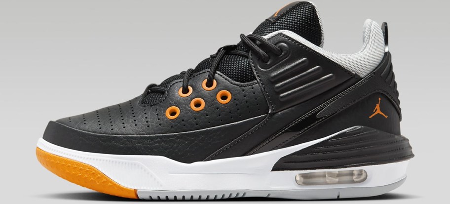 black, white, and orange jordan sneaker