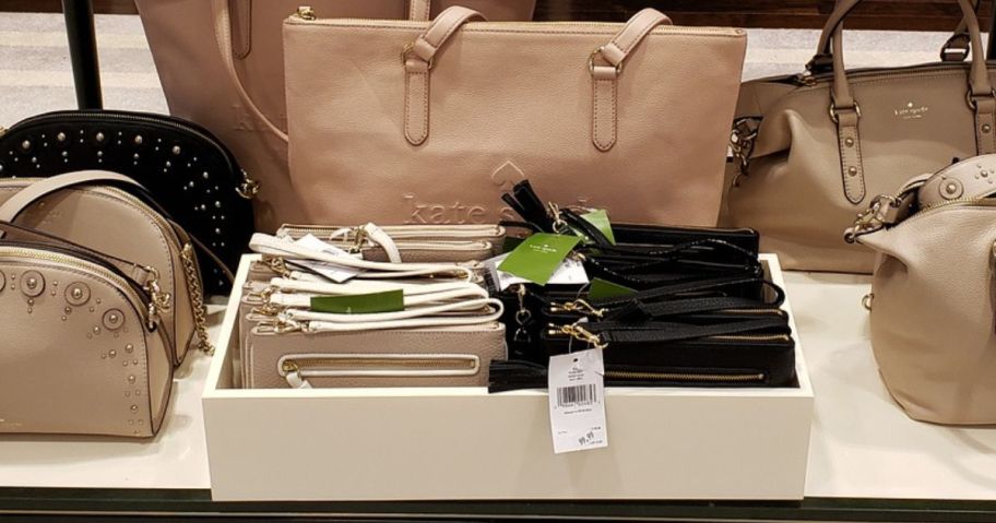 A display of sale wristlets at a Kate Spade Store