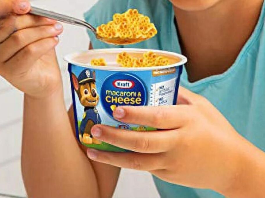 child eating kraft mac and cheese paw patrol pasta out of cup
