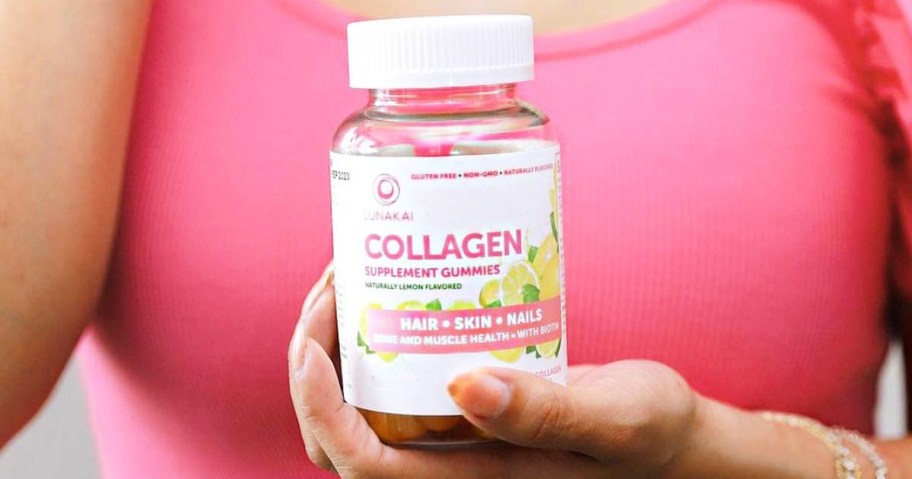 woman holding a bottle of Lunakai Collagen Gummies