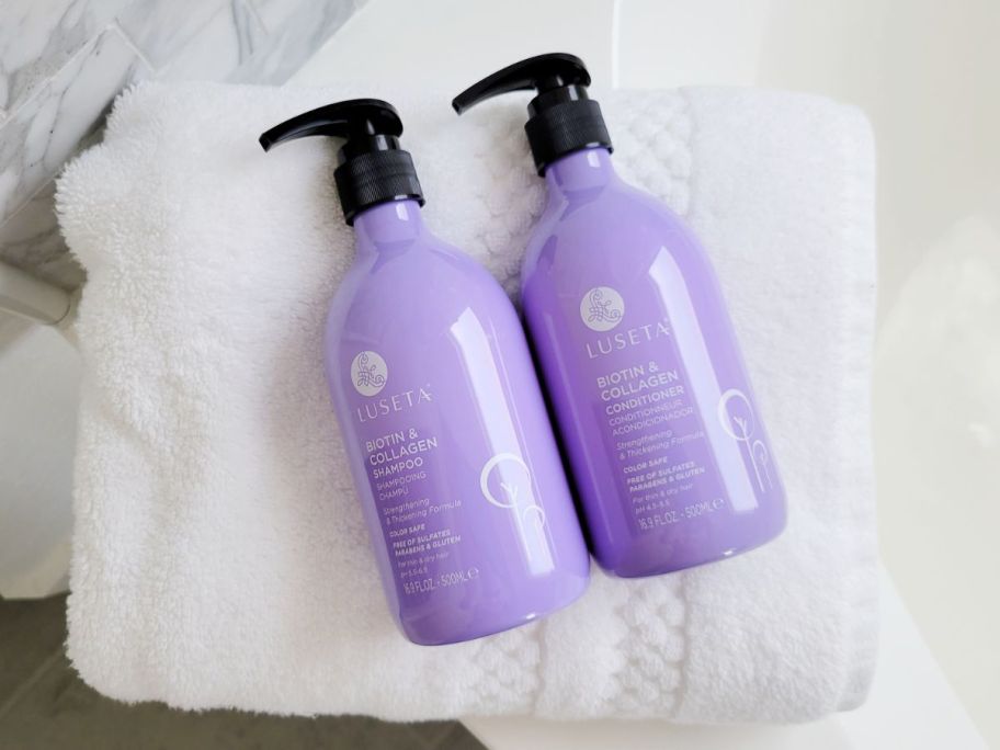 Luseta shampoo and conditioner set on a towel