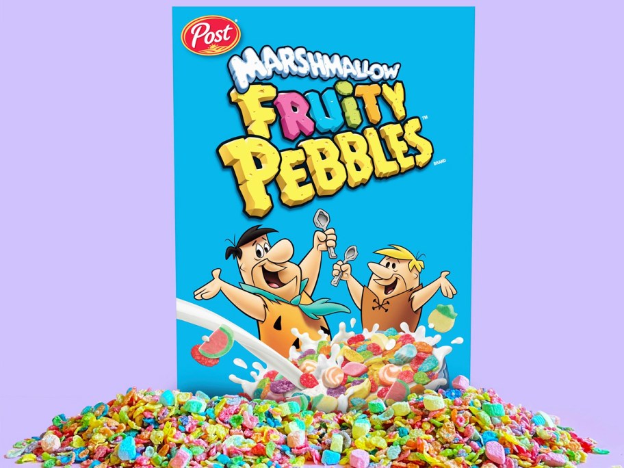 blue box of Marshmallow Fruity Pebbles Cereal surrounded by cereal