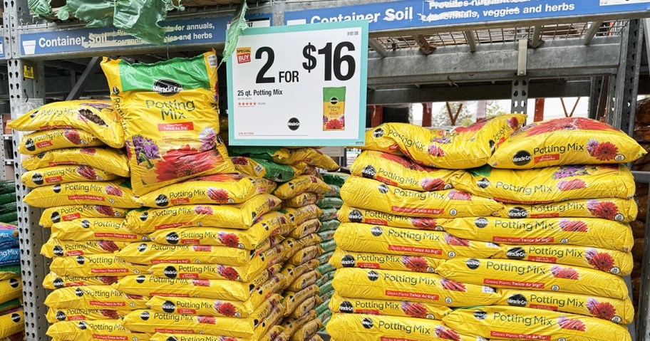 yellow bags of Miracle-Gro Potting Soil Mix on sale at Home Depot