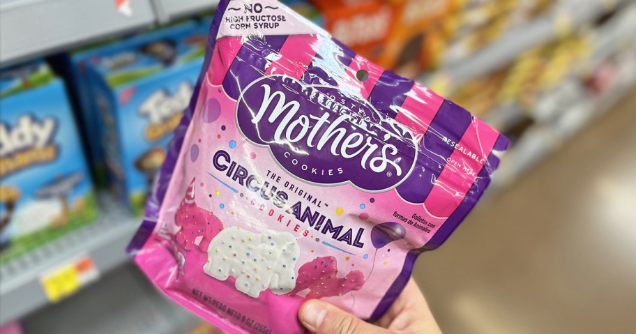 hand holding a bag of Mother's Circus Animal Cookies in store