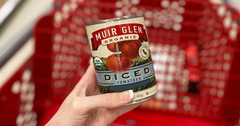 hand holding a can of Muir Glen Organic Diced Tomatoes
