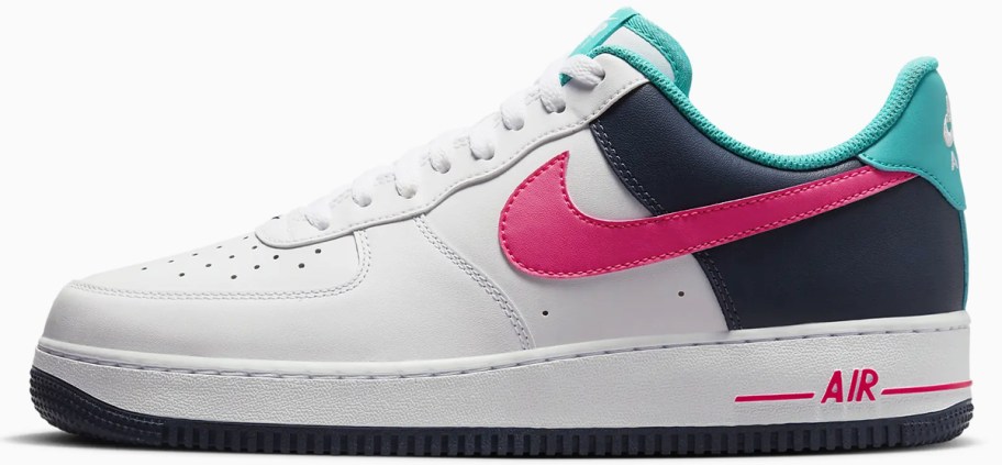 white, black, pink, and teal nike sneaker
