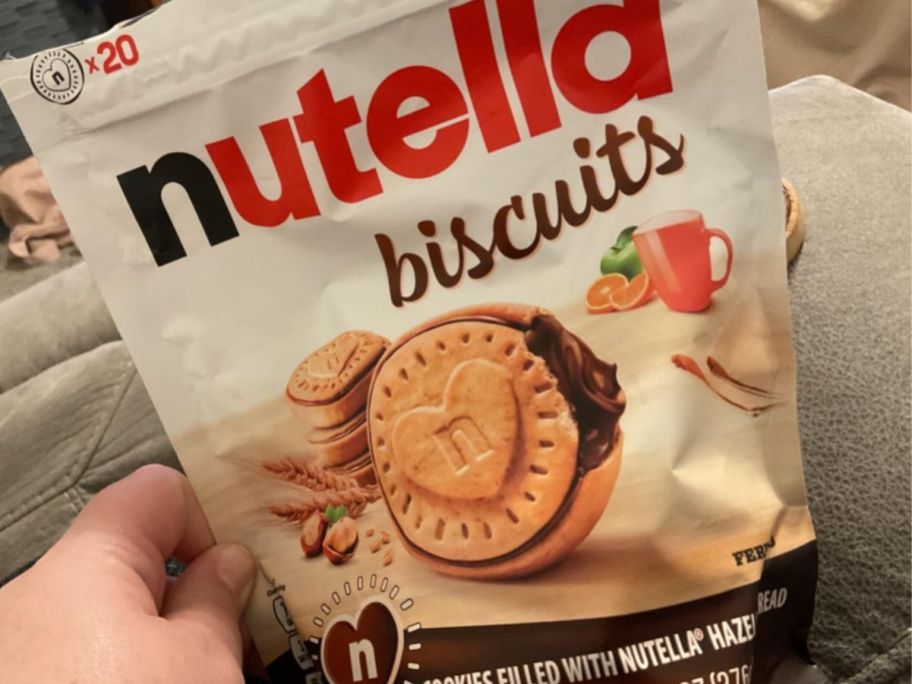 Hand holding a bag of Nutella Biscuits
