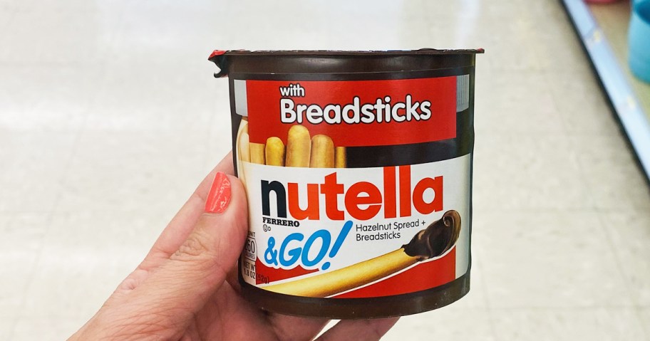 hand holding Nutella & Go snack pack in store