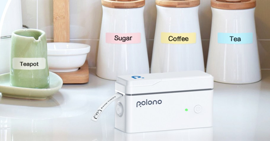 label printing out of a white label maker on kitchen counter