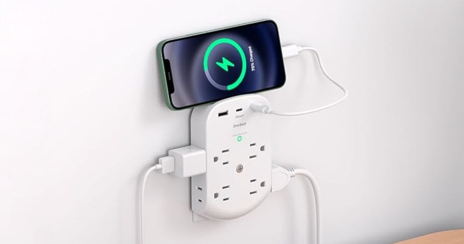 Power Extender Outlet plugged in on a white wall