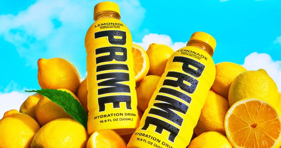 yellow bottles of Prime Hydration Drink on pile of lemons