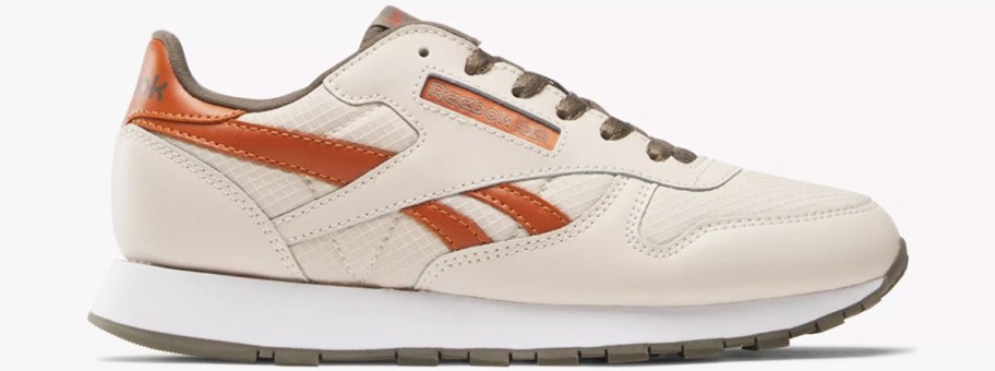 off-white and orange leather reebok sneaker