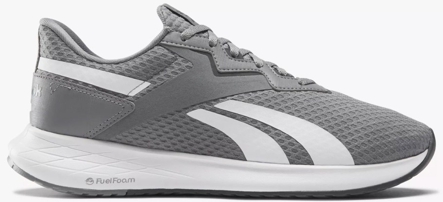 grey and white reebok running shoe