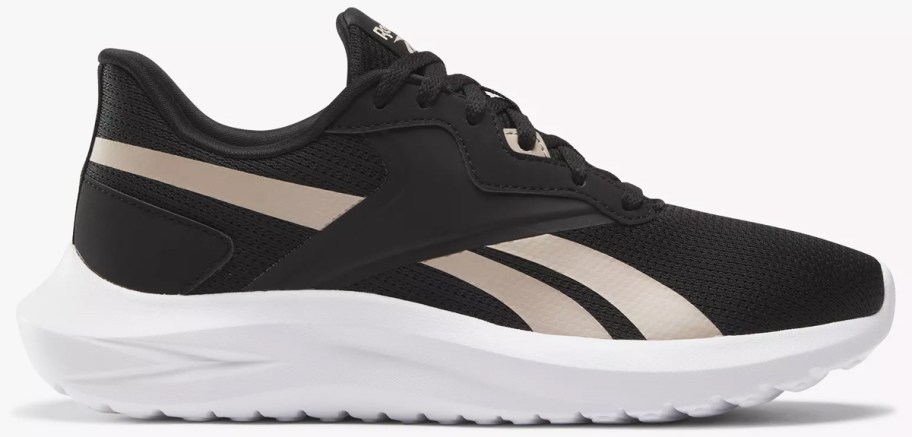 black and gold reebok training shoe