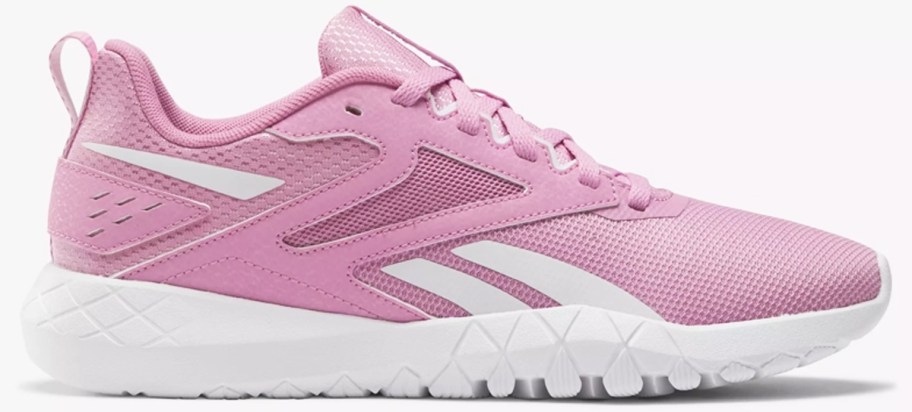 pink and white reebok sneaker