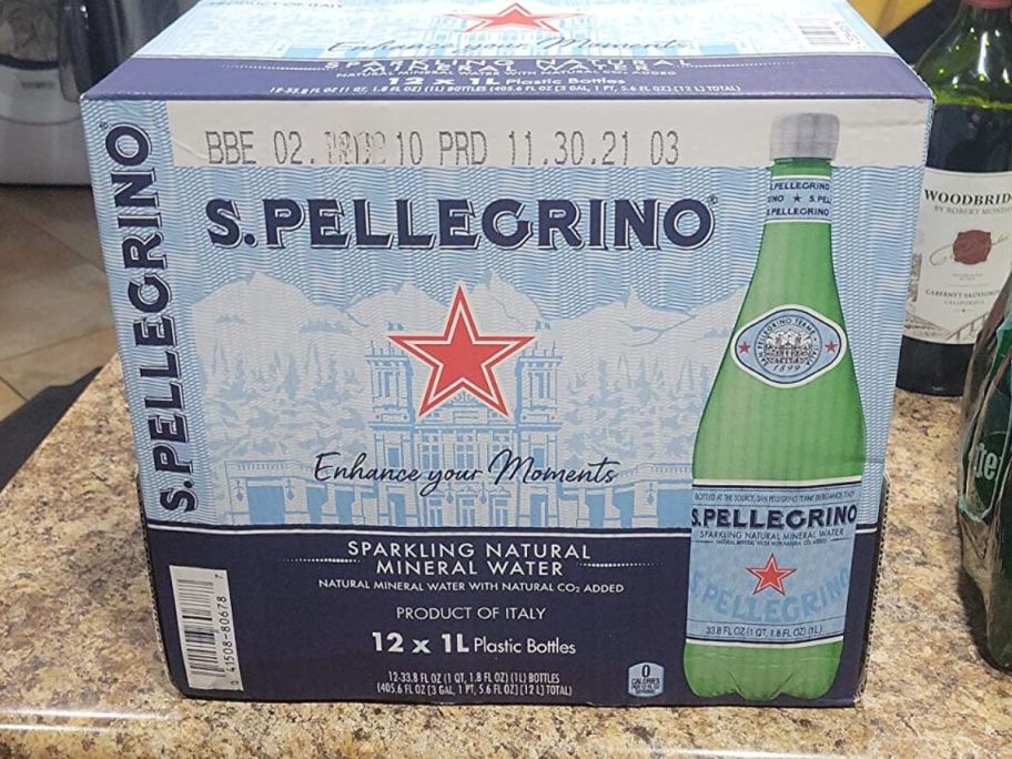 San Pellegrino Sparkling Mineral Water 33.8oz Plastic Bottles 12-Count on counter