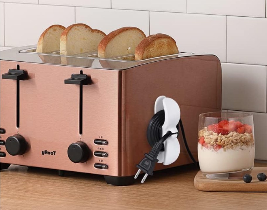 A toaster with a Sisbroo cord wrapper, one of the best kitchen gadgets 