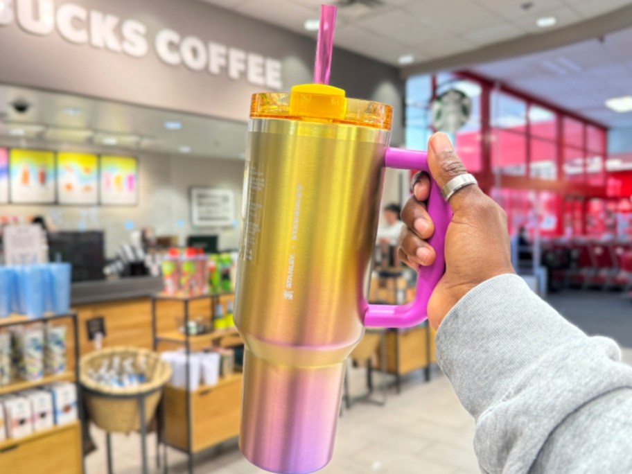 Stanley x Starbucks cup in woman's hand at the store