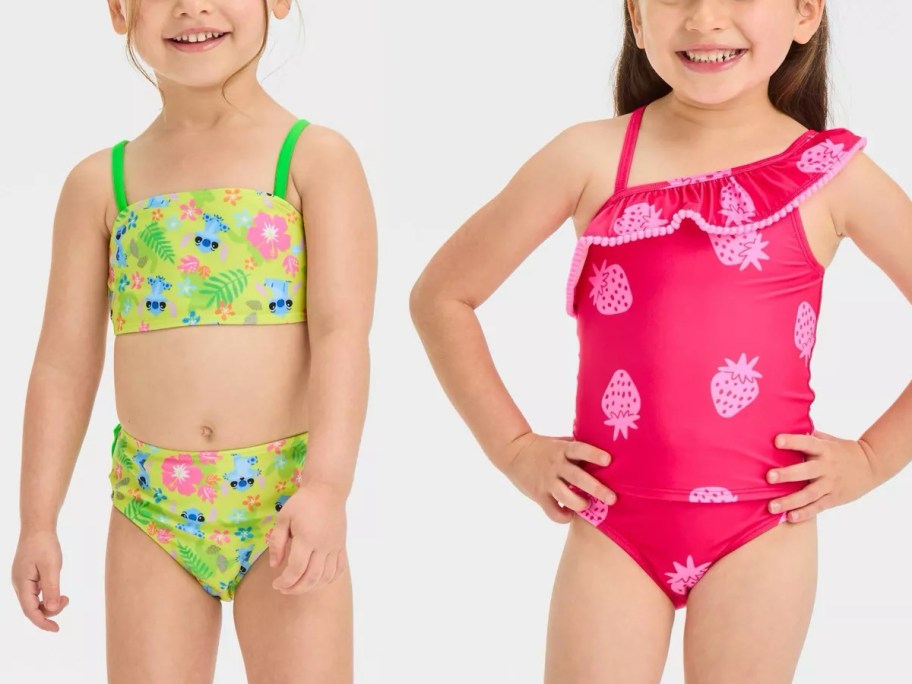 two girls wearing Target toddler girl swimsuits 