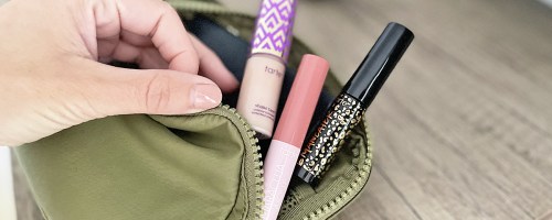 mini tarte cosmetics in green lululemon belt bag
