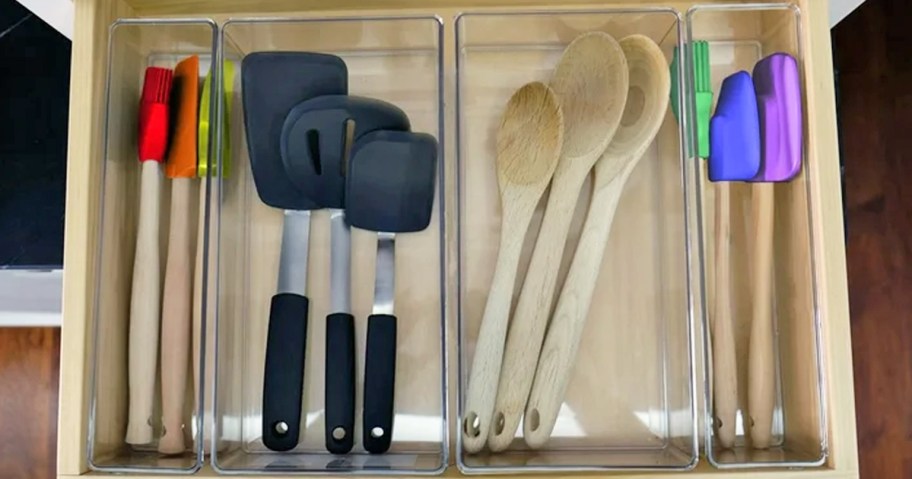 clear drawer inserts with spatulas and wooden spoons