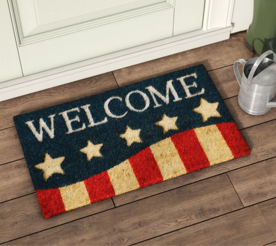 A patriotic welcome mat from Wayfair that doubles as Fourth of July decor