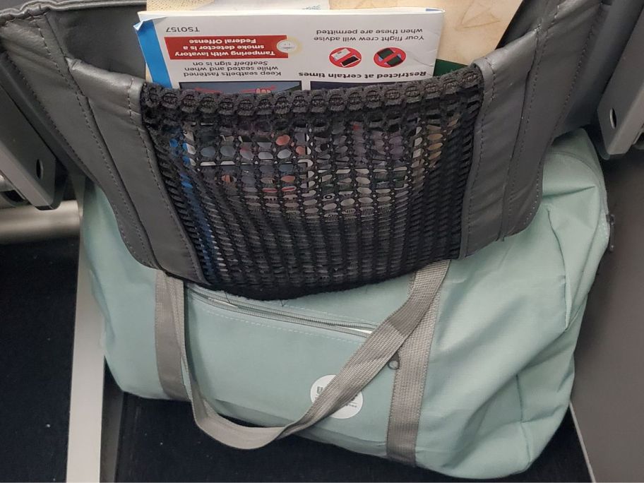 WANDF Travel Duffel Bag in airplane under the seat