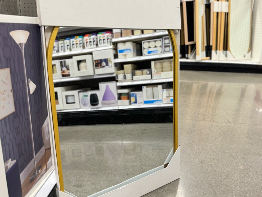 Walmart arched mirror displayed on the floor at the store