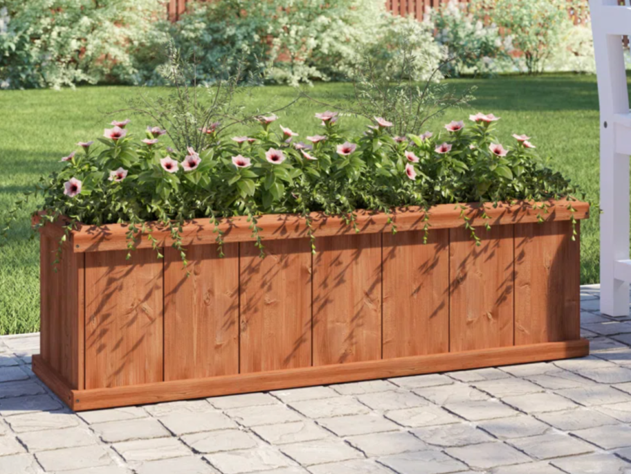 An outdoor raised garden bed available at the Wayfair Memorial Day Sale of 2024