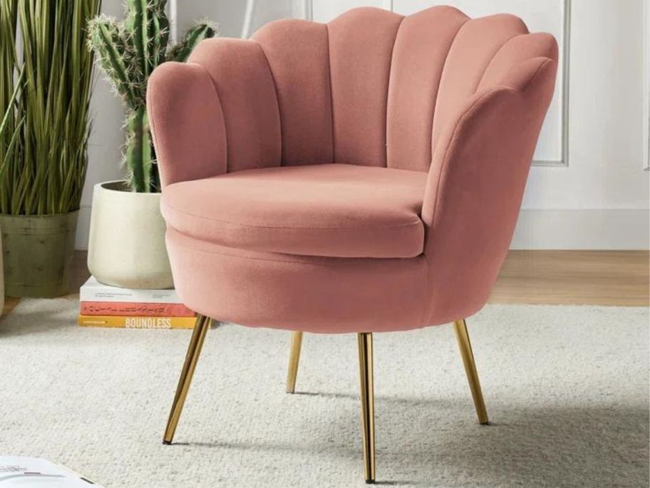 A pink Etta Avenue Hendrix Velvet Barrel Chair