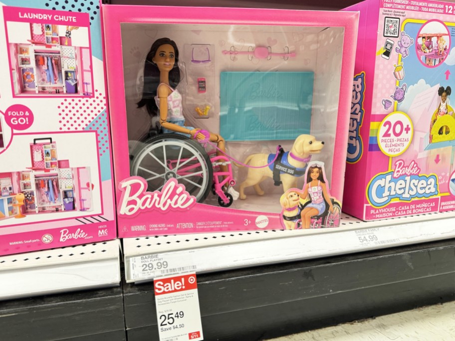wheelchair barbie set on store shelf with sale tag