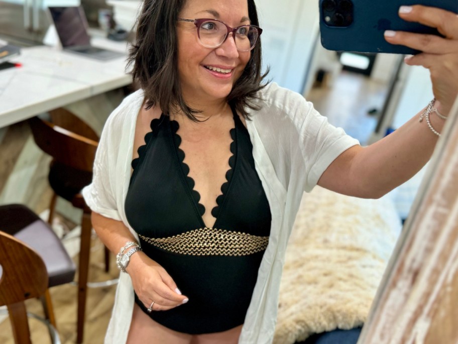 Woman wearing black bathing suit from cupshe