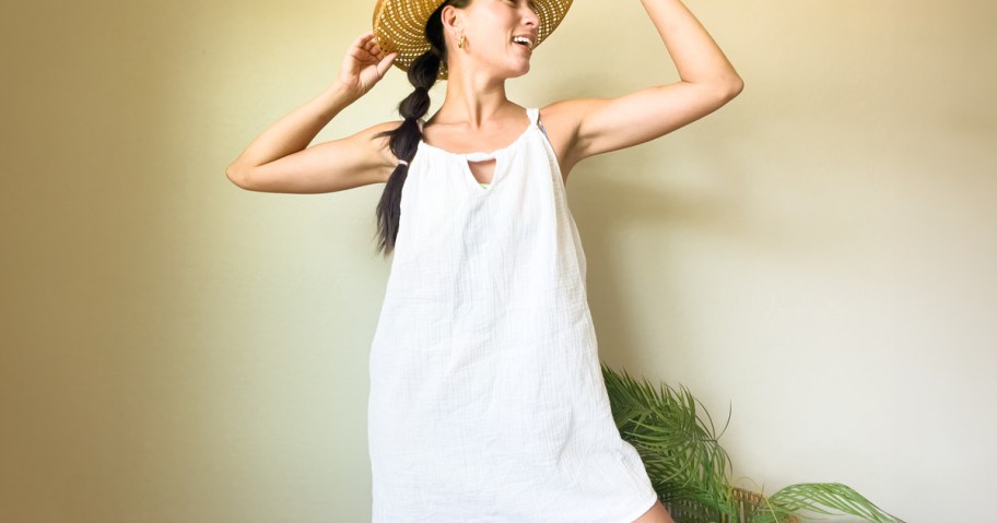 Women's Tunneled Neckline Short Cover Up Dress being worn by a woman
